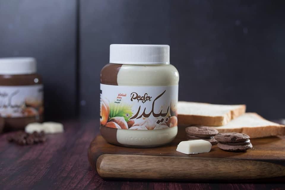 Pecder white spread jar presented with bread and biscuits